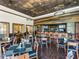 Community bar with wooden accents and comfortable seating at 13315 Carnoustie Cir, Dade City, FL 33525