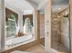Primary bathroom with soaking tub and separate shower at 13315 Carnoustie Cir, Dade City, FL 33525