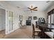 Home office or game room with a wet bar and rocking chair at 13315 Carnoustie Cir, Dade City, FL 33525