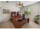 Home office features a large L-shaped desk and window at 13315 Carnoustie Cir, Dade City, FL 33525