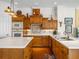 Bright kitchen with ample cabinetry and a large island at 13315 Carnoustie Cir, Dade City, FL 33525