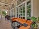 Relaxing outdoor patio with comfortable seating and views at 13315 Carnoustie Cir, Dade City, FL 33525