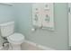 Simple toilet and shower in a small bathroom at 1429 Villa Capri Cir # 306, Odessa, FL 33556