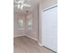 Bright bedroom with neutral walls, ceiling fan, and large windows at 1429 Villa Capri Cir # 306, Odessa, FL 33556