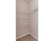 Spacious closet with wire shelving, providing ample storage space at 1429 Villa Capri Cir # 306, Odessa, FL 33556