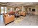 Community room with comfortable seating, a kitchenette, and a large TV at 1429 Villa Capri Cir # 306, Odessa, FL 33556