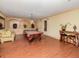 Game room with a pool table, comfortable seating, and additional tables at 1429 Villa Capri Cir # 306, Odessa, FL 33556