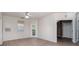 Living Room with wood-look floors and access to balcony at 1429 Villa Capri Cir # 306, Odessa, FL 33556