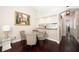 Dining area with glass-top table and beige chairs at 158 Sun Isle Cir, Treasure Island, FL 33706