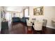 Bright dining area with glass table and four chairs at 158 Sun Isle Cir, Treasure Island, FL 33706