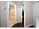 Hallway with access to bathroom and additional storage at 158 Sun Isle Cir, Treasure Island, FL 33706
