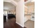 Open kitchen with granite counters and white appliances at 158 Sun Isle Cir, Treasure Island, FL 33706