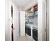 Convenient laundry room with washer, dryer, and storage at 158 Sun Isle Cir, Treasure Island, FL 33706