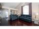 Comfortable living room with dark hardwood floors and two sofas at 158 Sun Isle Cir, Treasure Island, FL 33706