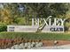 Bexley Club community sign with landscaping and cafe at 16877 Red Brick Ln, Land O Lakes, FL 34638