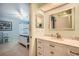Updated bathroom with a white vanity and marble countertop at 1752 Atrium Dr, Sun City Center, FL 33573