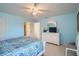 Bedroom with white dresser and ensuite bathroom access at 1752 Atrium Dr, Sun City Center, FL 33573