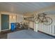 Garage with bicycles, storage, and a ladder at 1752 Atrium Dr, Sun City Center, FL 33573