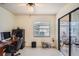 Bright home office with patio access at 1752 Atrium Dr, Sun City Center, FL 33573