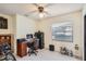 Home office features built-in shelving and a view of the patio at 1752 Atrium Dr, Sun City Center, FL 33573