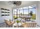 Relaxing screened patio overlooking a tranquil lake at 18491 Green Garden Ct, Venice, FL 34293