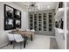 Elegant dining area with a built-in wine rack at 18491 Green Garden Ct, Venice, FL 34293