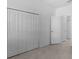 Spacious bedroom closet with built-in shelving at 2009 Gardenia Ave, Port Charlotte, FL 33953
