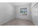 Simple bedroom with a window and double door closet at 2009 Gardenia Ave, Port Charlotte, FL 33953