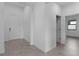 Bright foyer with tile flooring, and doors to other rooms at 2009 Gardenia Ave, Port Charlotte, FL 33953