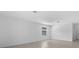 Bright and airy living room with tile floors and large window at 2009 Gardenia Ave, Port Charlotte, FL 33953