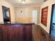 Simple dining area with wood-paneled walls at 21732 Bell Lake Rd, Land O Lakes, FL 34639