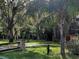 Landscaped yard with a stone driveway at 21732 Bell Lake Rd, Land O Lakes, FL 34639