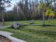 Vacant lot with a split rail fence and trees at 21732 Bell Lake Rd, Land O Lakes, FL 34639