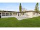 Spacious backyard with patio and large green grass at 2181 Wateroak N Dr, Clearwater, FL 33764