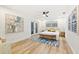 Bright bedroom with light wood floors and access to a patio at 2181 Wateroak N Dr, Clearwater, FL 33764
