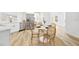 Bright dining area with a round table and four chairs at 2181 Wateroak N Dr, Clearwater, FL 33764