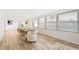 Sunlit dining area with wooden table and access to backyard at 2181 Wateroak N Dr, Clearwater, FL 33764