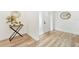 Light and airy entryway with a modern console table at 2181 Wateroak N Dr, Clearwater, FL 33764