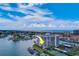 Waterfront condo building with boat slips and tennis courts at 240 Sand Key Estates Dr # 213, Clearwater, FL 33767