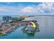 Waterfront condo building with pool and tennis courts at 240 Sand Key Estates Dr # 213, Clearwater, FL 33767