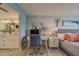 Bright bedroom with built-in workspace and coastal decor at 240 Sand Key Estates Dr # 213, Clearwater, FL 33767