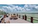 Waterfront community dock offering scenic views and seating at 240 Sand Key Estates Dr # 213, Clearwater, FL 33767