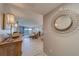 View through entryway showcasing living room and water view at 240 Sand Key Estates Dr # 213, Clearwater, FL 33767
