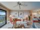 Living room with white couch, coastal decor, and view of water at 240 Sand Key Estates Dr # 213, Clearwater, FL 33767