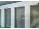 Secure storage units with individual numbered doors at 240 Sand Key Estates Dr # 213, Clearwater, FL 33767