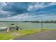 Scenic waterfront view with boats docked at piers at 240 Sand Key Estates Dr # 213, Clearwater, FL 33767