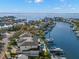 Aerial view of neighborhood on waterway and waterfront homes with boat docks at 2502 S Dundee St, Tampa, FL 33629