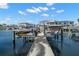 Private boat dock features boat and jet ski lifts for waterfront living at 2502 S Dundee St, Tampa, FL 33629