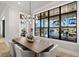Dining area with modern chandelier, a view of the water, and contemporary furnishings at 2502 S Dundee St, Tampa, FL 33629