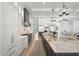 Well-appointed kitchen with custom cabinets, stainless appliances, and a center island at 2502 S Dundee St, Tampa, FL 33629